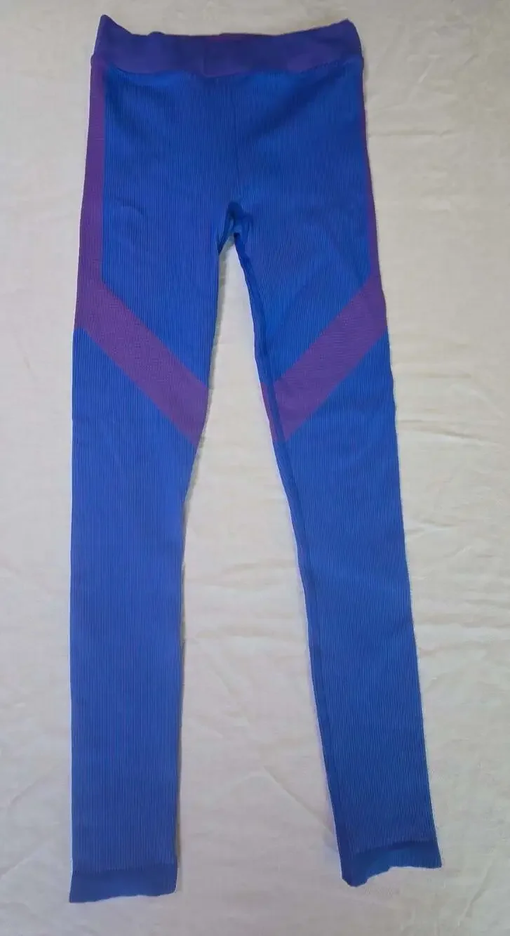 Alo Yoga Ribbed High-Waist Seamless Leggings in Blue and Purple. 025